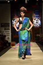 Model walks the ramp for Niki Mahajan show on Wills Lifestyle India Fashion Week 2011-Day 4 in Delhi on 9th April 2011 (146).JPG